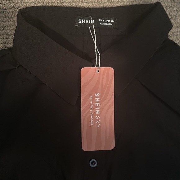 Black fringe shorts, black fringe crop top with middle knot, and sparkly belt - Picture 5 of 7